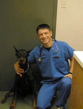 Dr. Horia Popa with Doberman named Paco